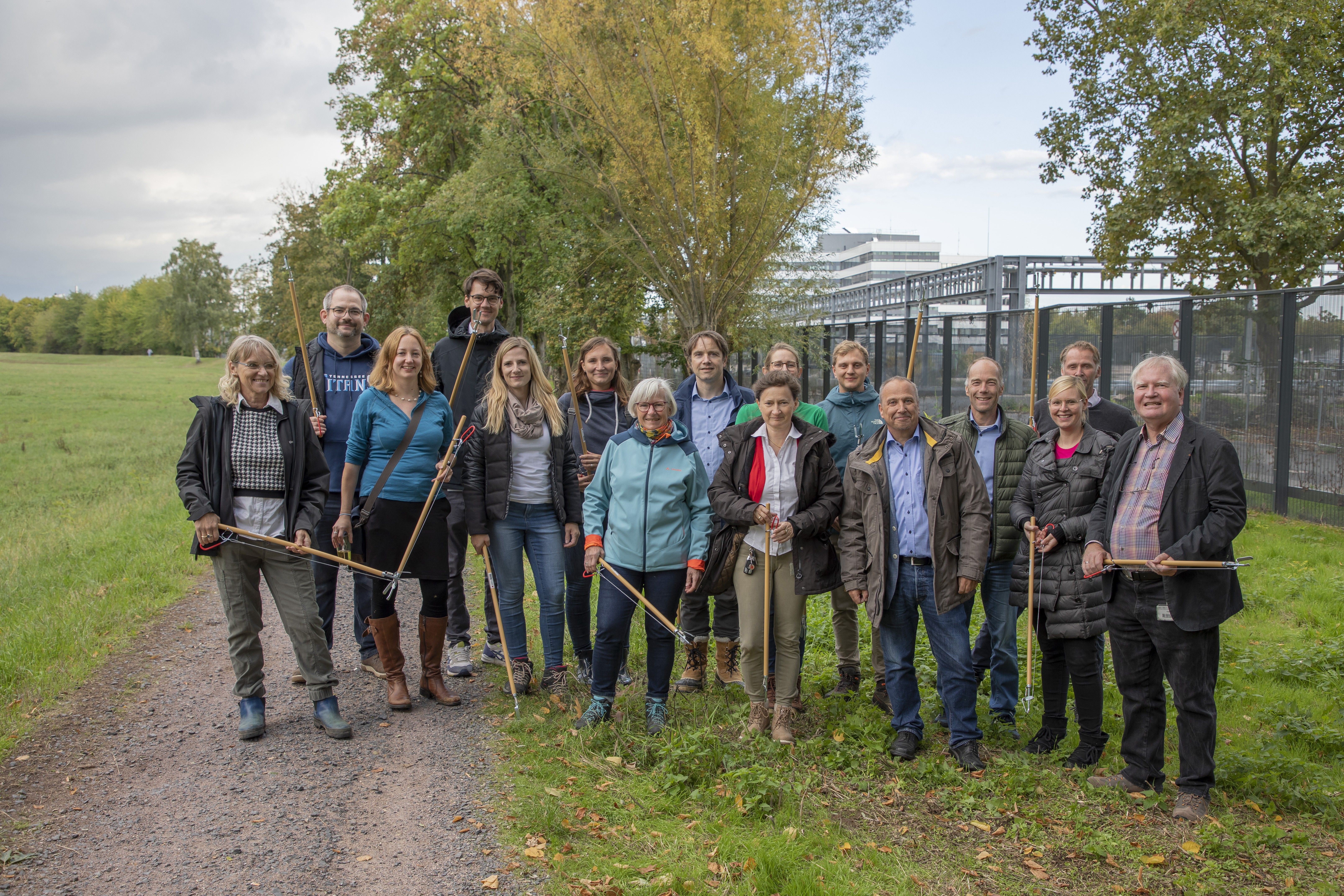 Employees cleaning nature